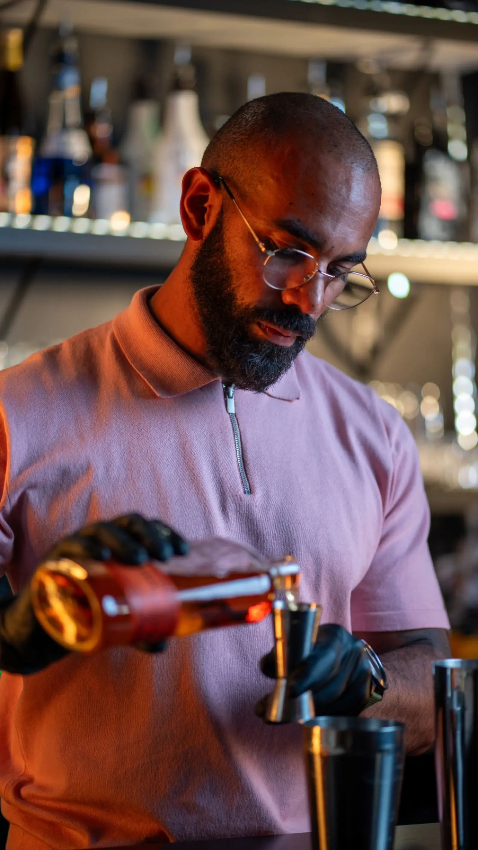 Bartender serving premium drinks at Kino Events House