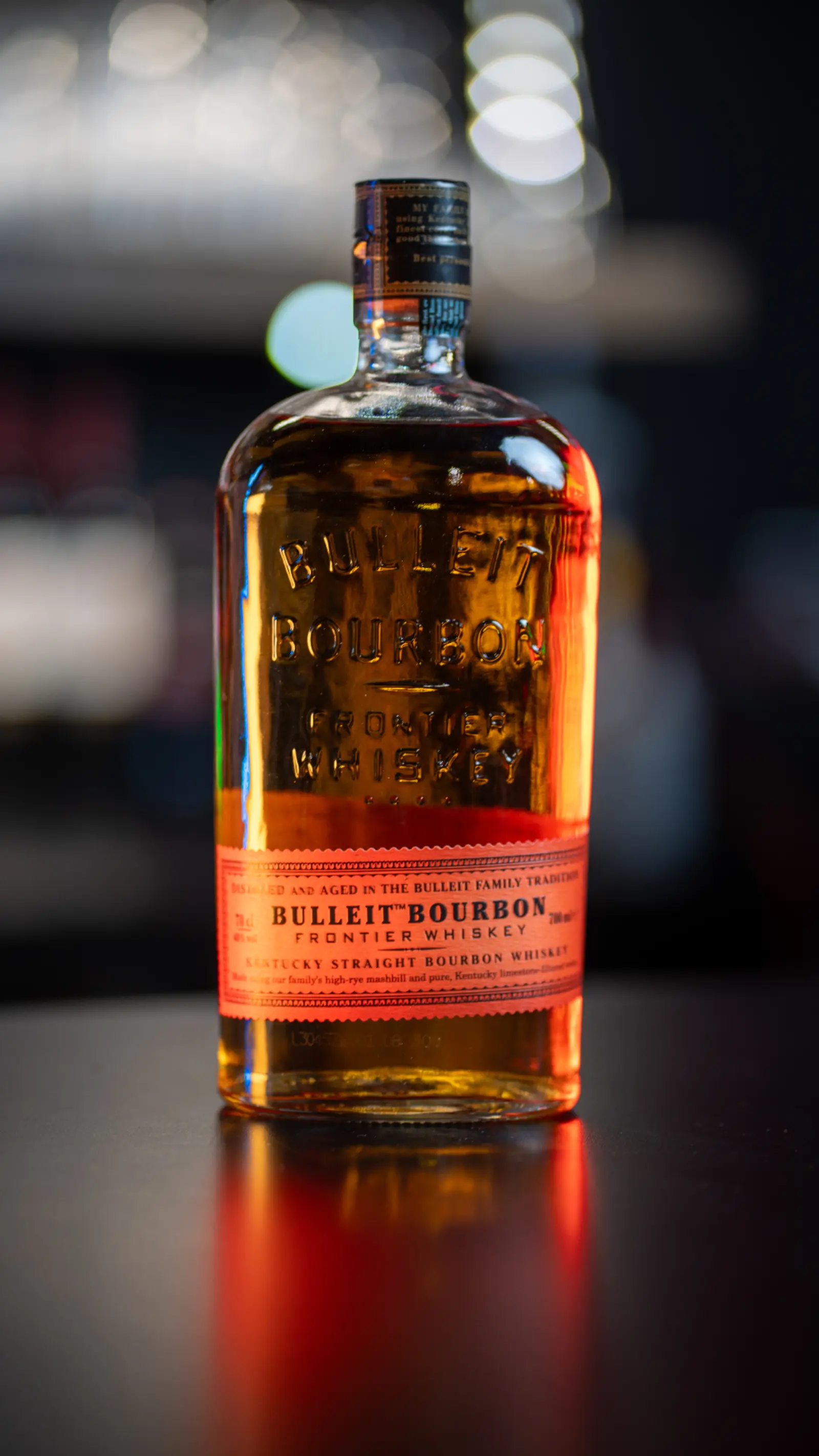 Premium spirit bottle behind the Kino bar