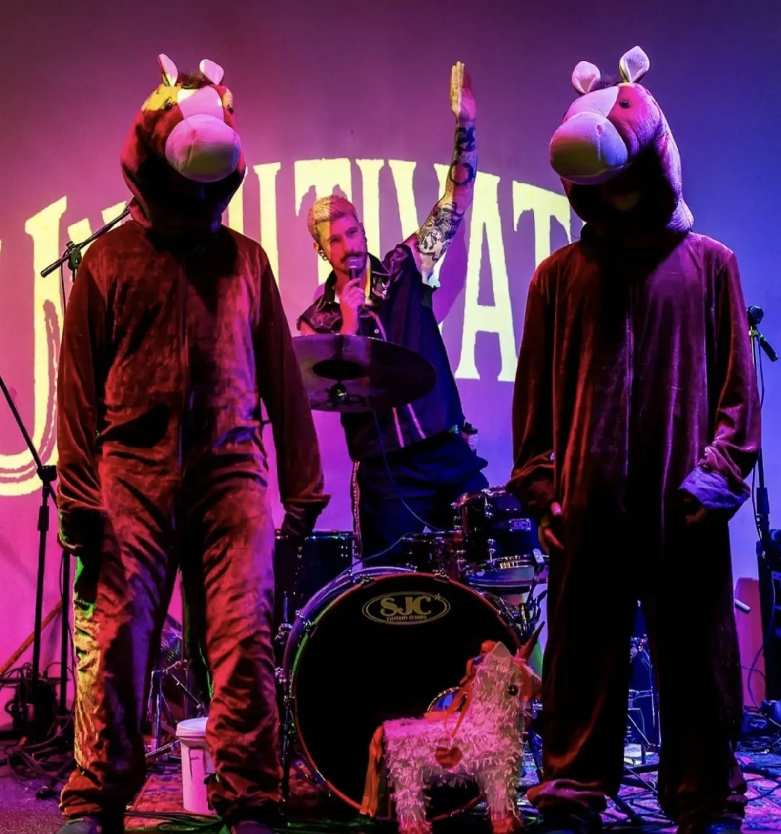Performers in costume on stage at Kino Events House