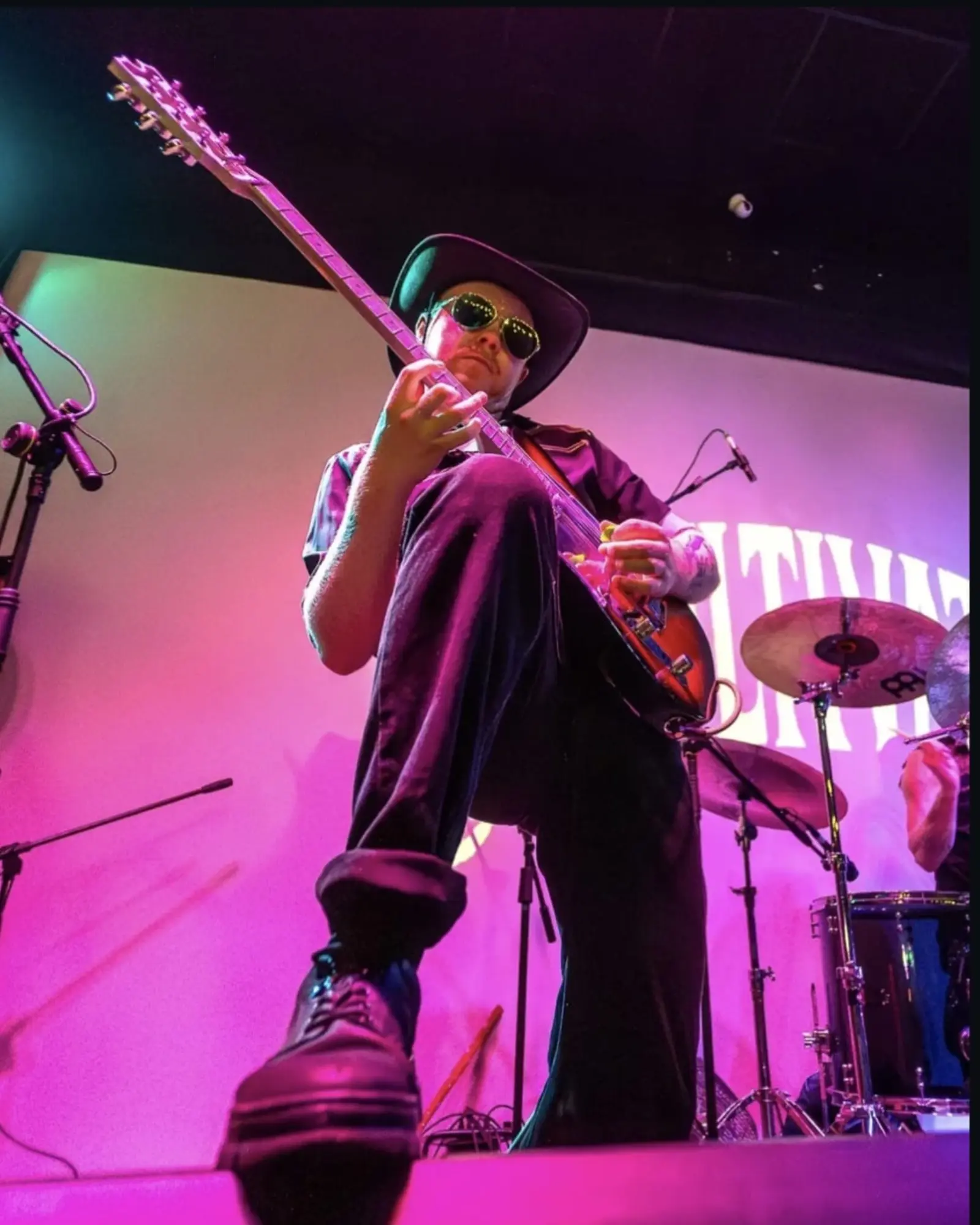 Guitarist performing live at Kino Events House