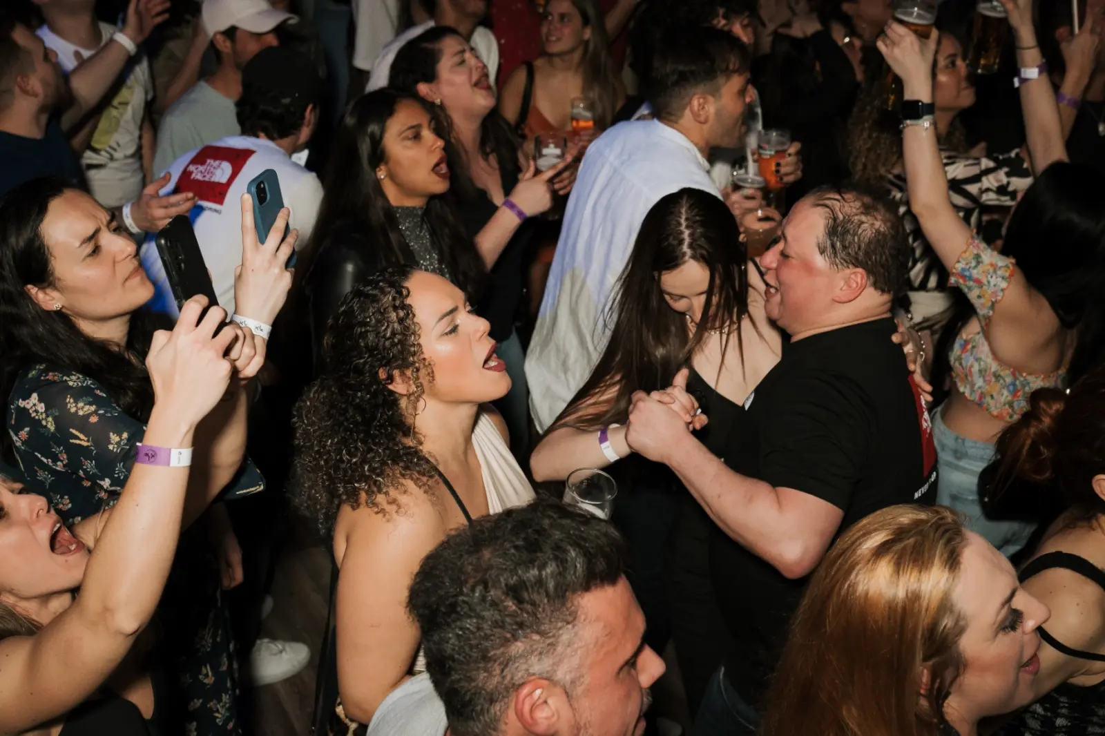 Live show crowd singing at Kino Events House