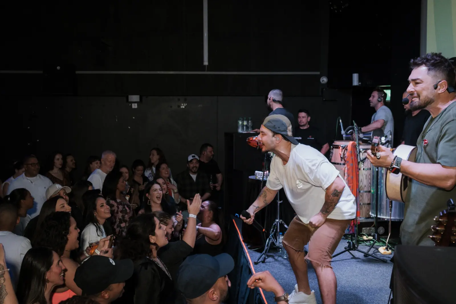 Singer engaging with crowd at Kino Events House